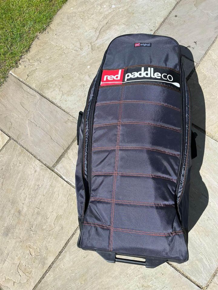 Red Paddle Co 10’6 Ride Inflatable Stand Up Paddle Board Package, Blue