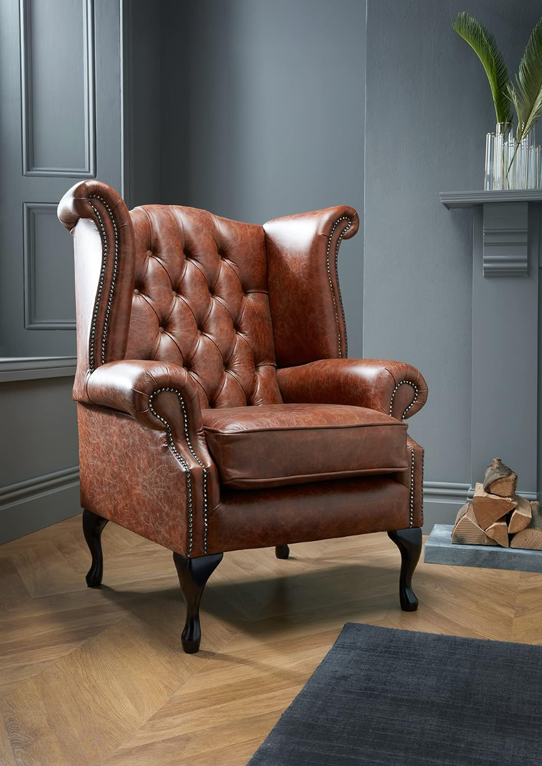 Chesterfield wingback armchairs